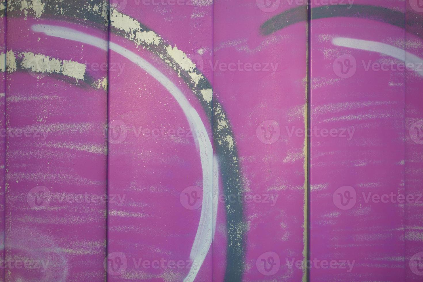 Part of abstract gravity multicolored with bright strokes. Painted concrete wall. photo