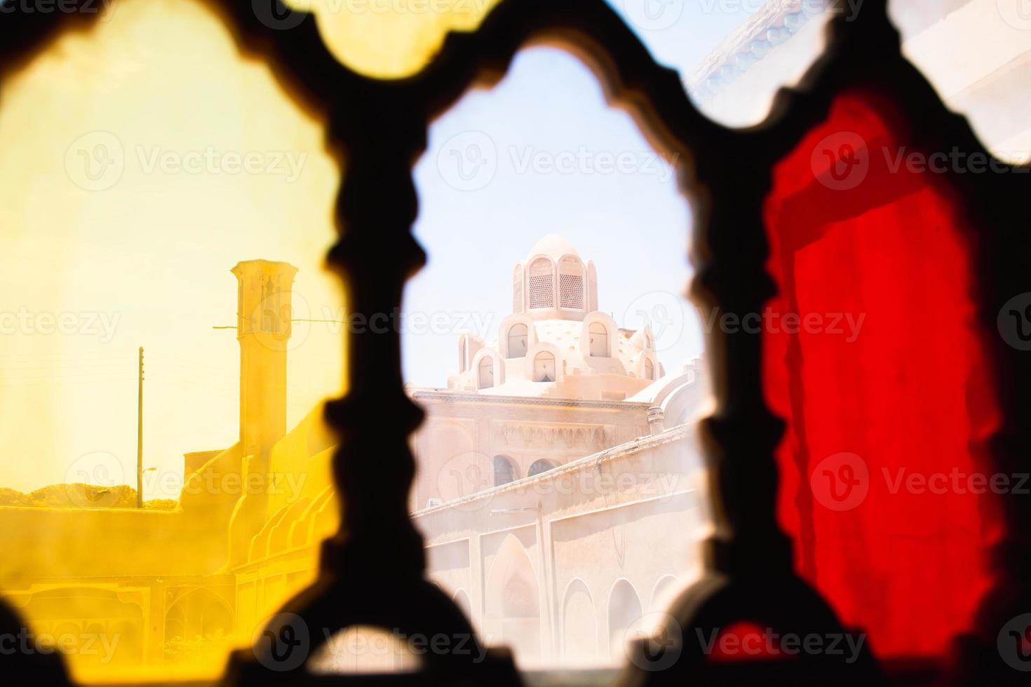 Hammam Soltan Amir Ahmad the roof and the architecture. Tabatabaei Historical House in Kashan, Iran. Wonderful view of traditional colorful Iranian stained glass windows. photo