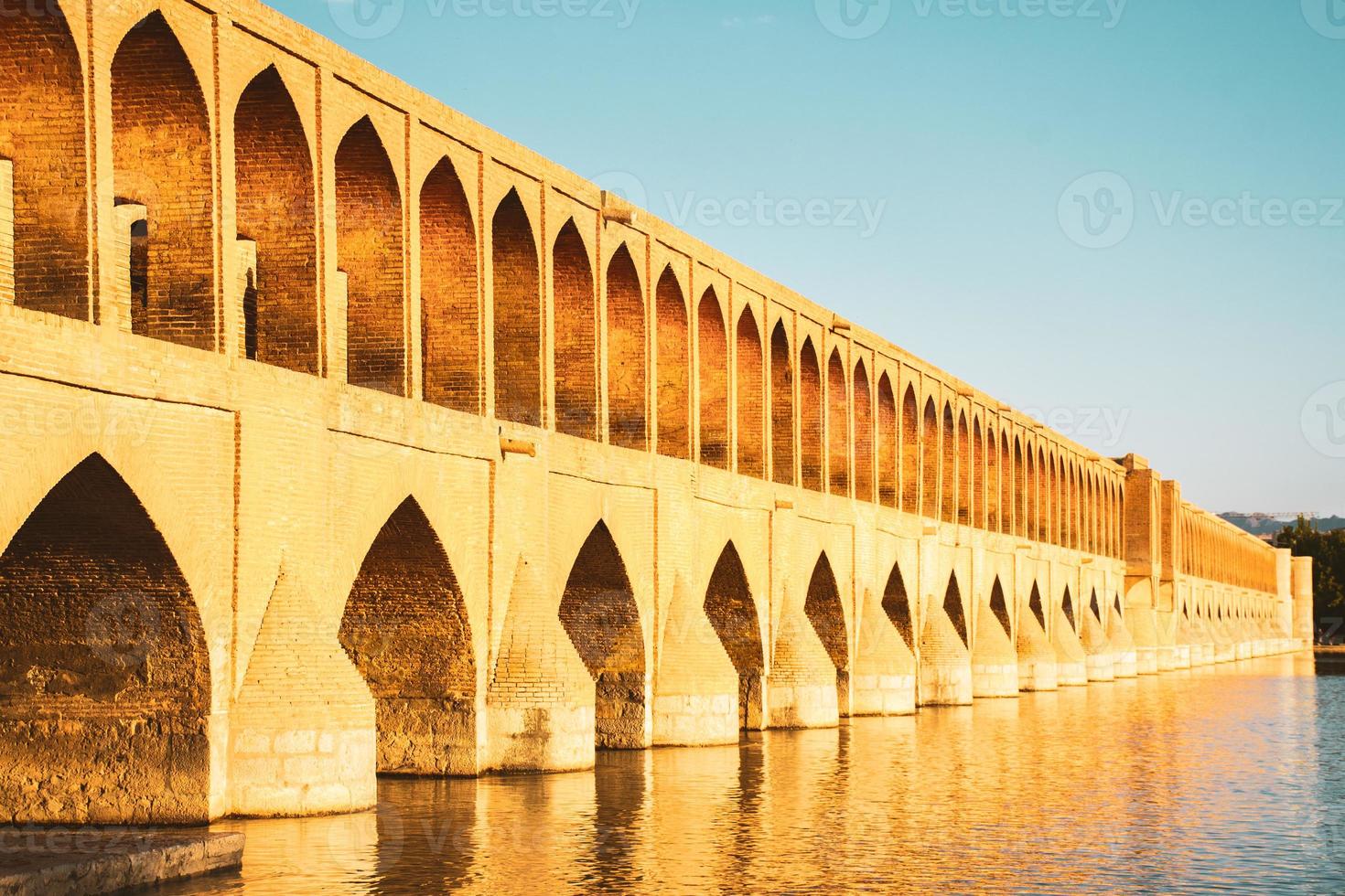 Isfahan, Iran, 2022 - SioSe Pol or Bridge of 33 arches, one of the oldest bridges of Esfahan and longest bridge on Zayandeh River photo
