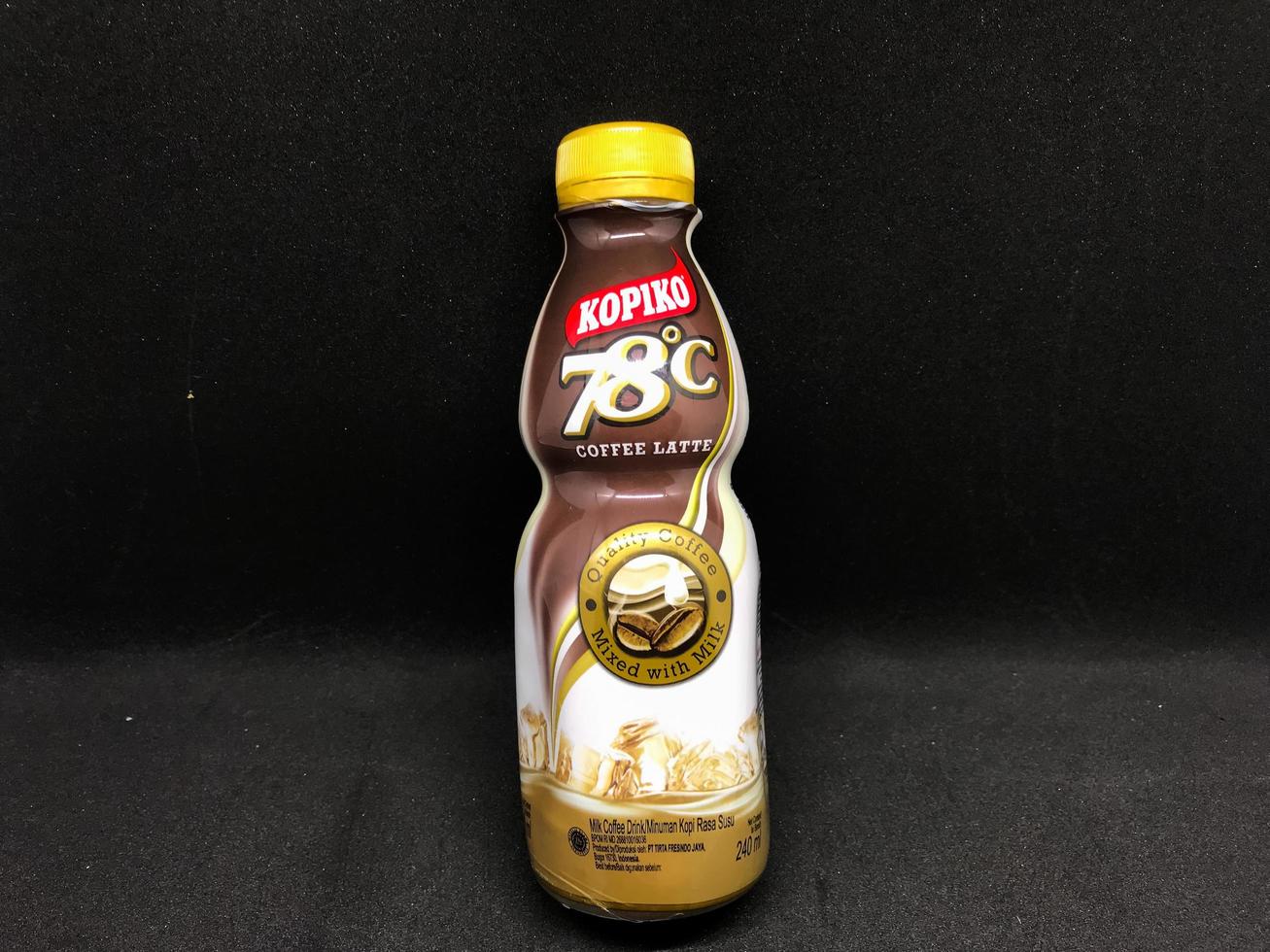 Surakarta, Indonesia. October 13, 2022. kopiko flavored coffe latte with black background photo