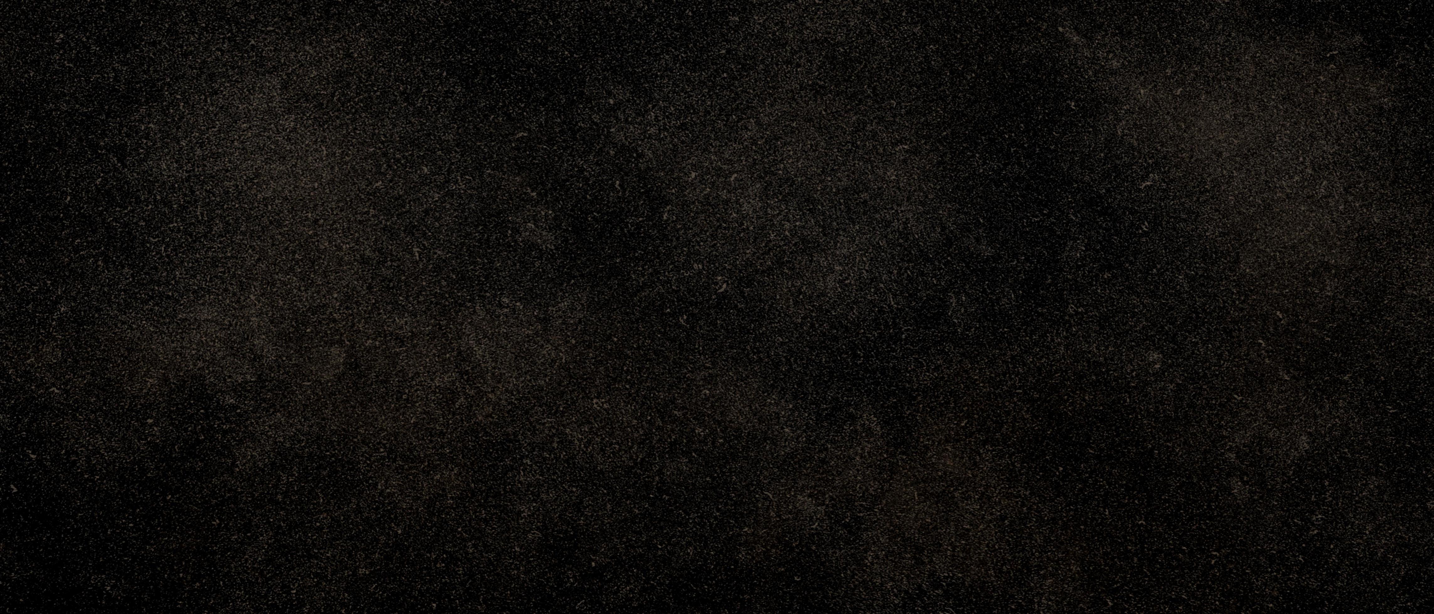 Grunge rough black distressed noise grain texture. Black granite slabs