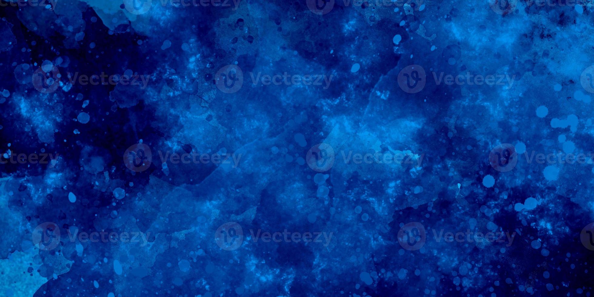 blue watercolor and paper texture. beautiful dark gradient hand drawn by brush grunge background. watercolor wash aqua painted texture close up, grungy design. blue nebula sparkle star universe. photo