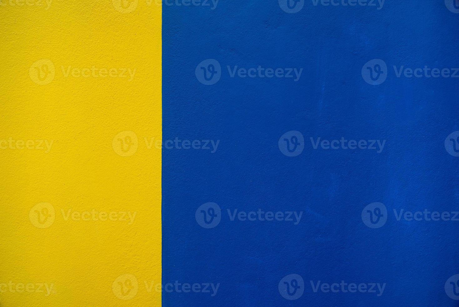 Blue and yellow wall background texture photo