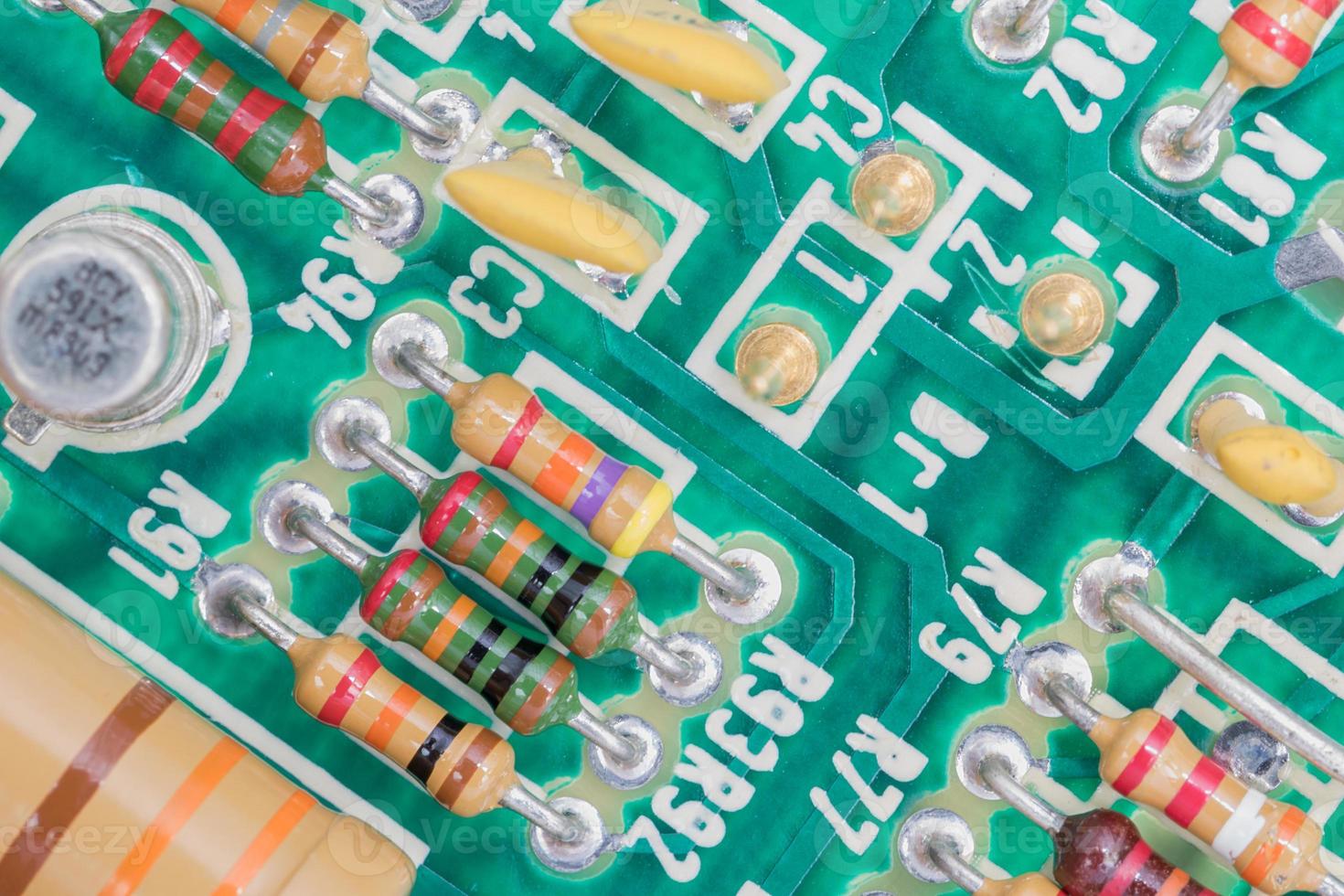 Condensers and Resistor assembly on the circuit board photo