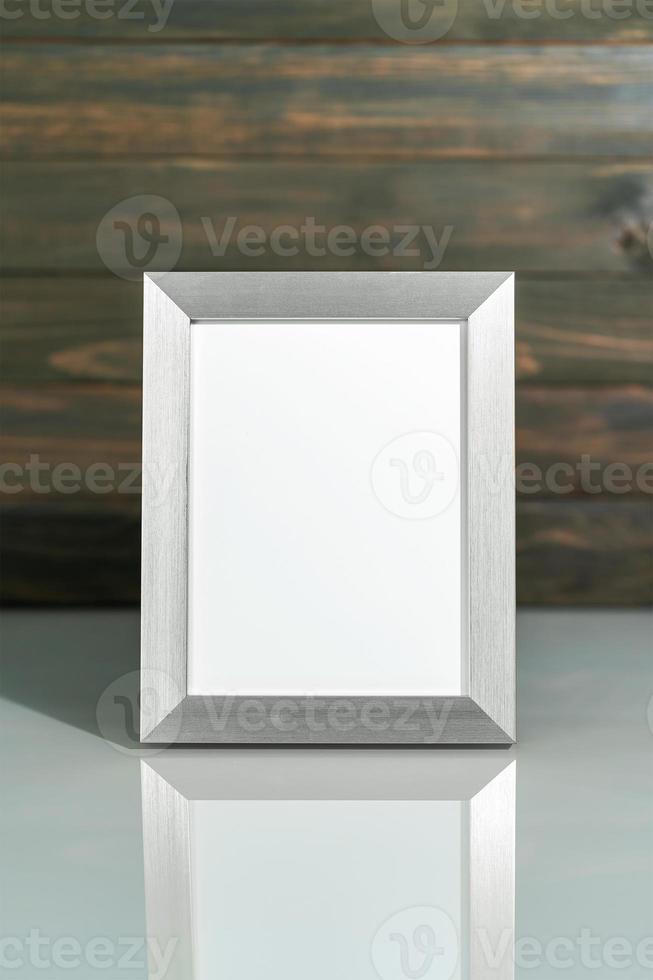 Picture silver frame mock up on table photo