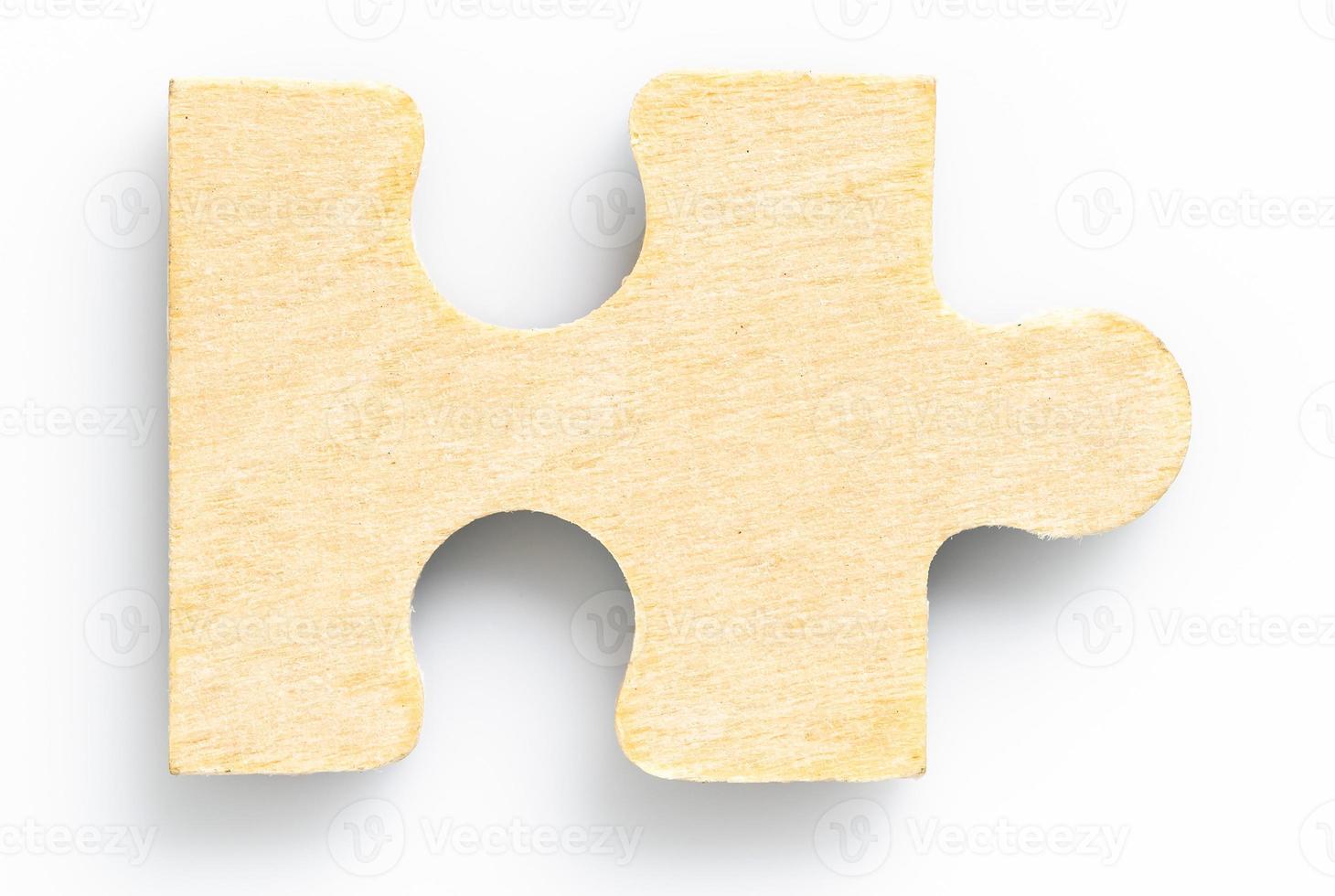 Shot of one wood jigsaw puzzel photo