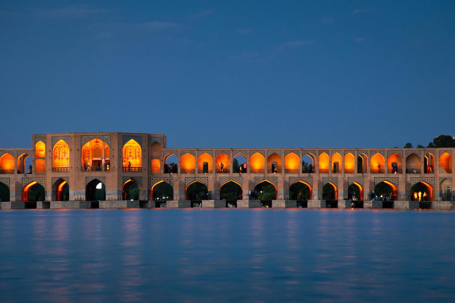 Isfahan, Iran , 2022 - Old Khajoo bridge, across the Zayandeh River in Isfahan, Iran. photo