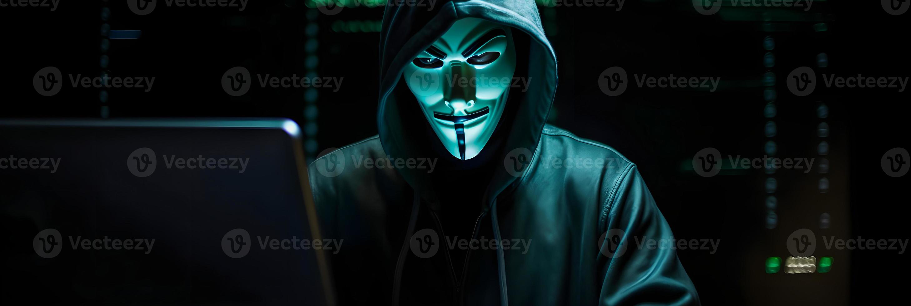 Unveiling the Enigmatic World of Cybercrime. A White Masked Hacker's Front View Amidst Dark Hood and Green Matrix Code Background photo