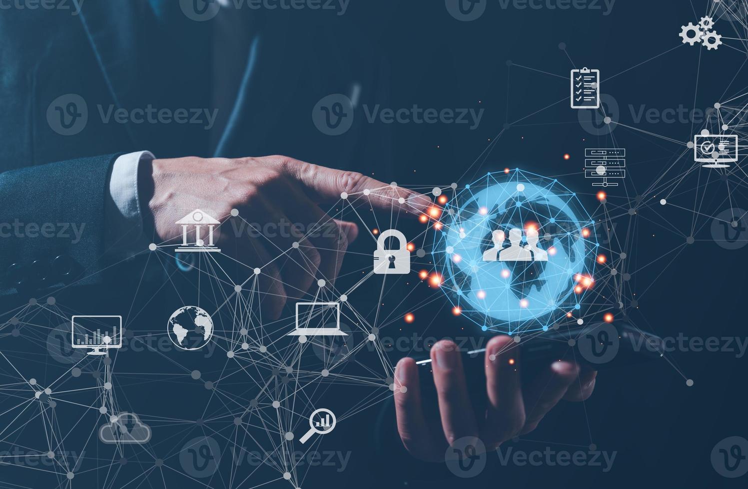 technology IOT concept, businessman holding virtual global internet network and icons photo
