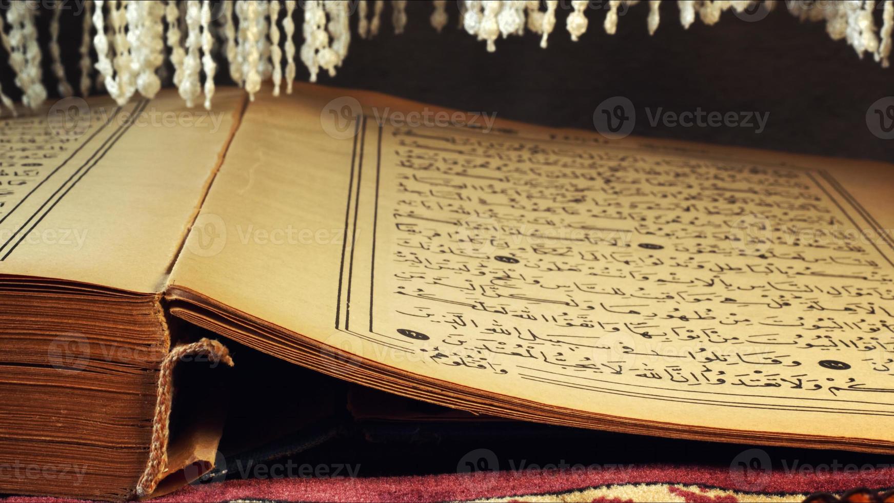 Quran the holy book of muslim religion photo