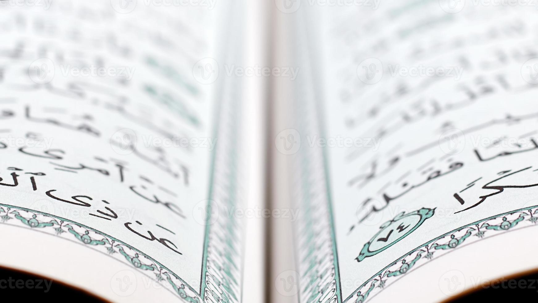 Quran the holy book of muslim religion photo