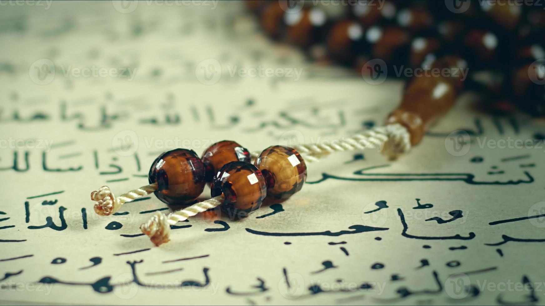 Quran the holy book of muslim religion and Pray Counting Bead photo