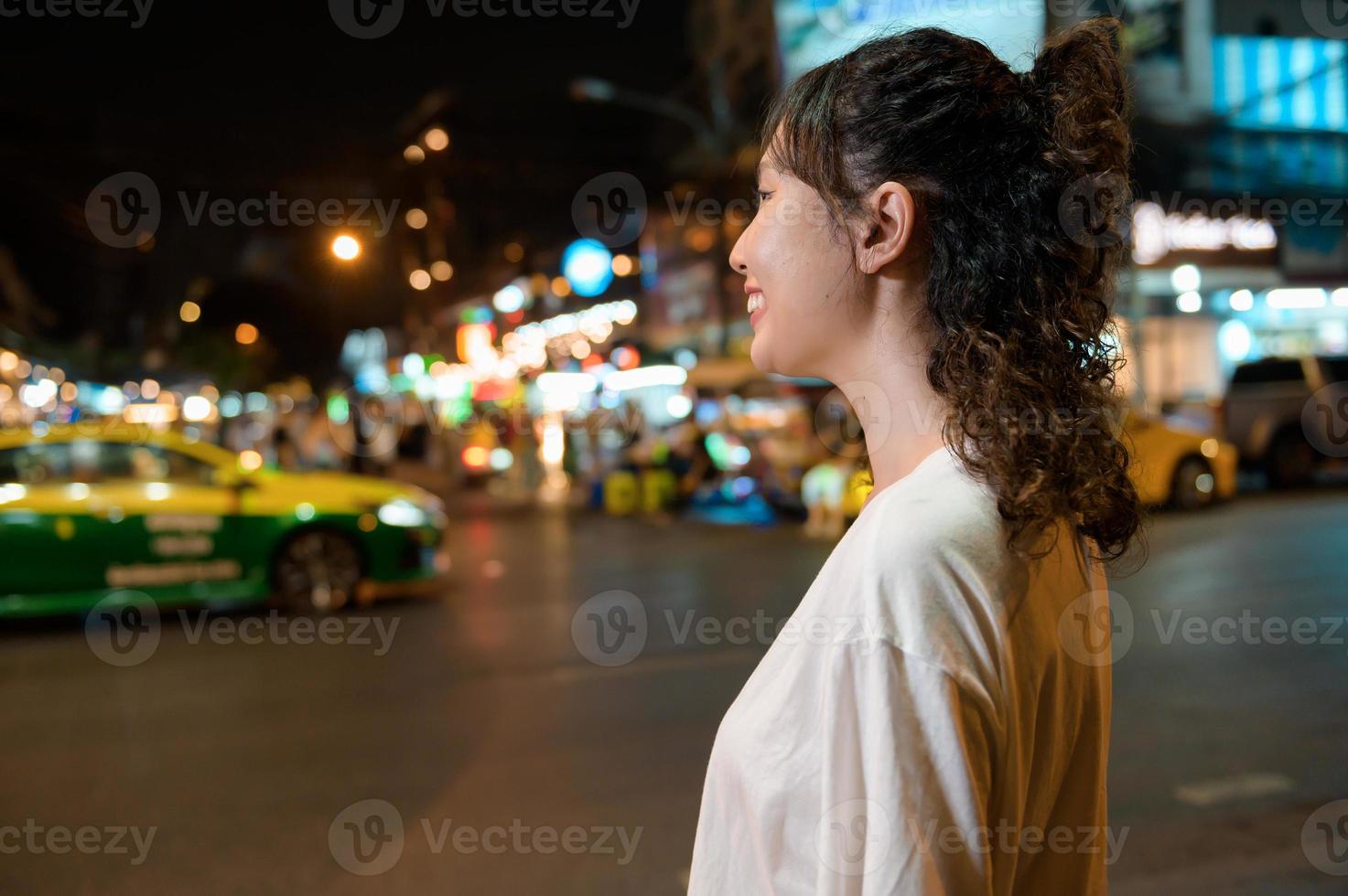 woman traveler visiting in Bangkok, Tourist with backpack and hat  sightseeing in Chatuchak Weekend Market, landmark and popular attractions  in Bangkok, Thailand. Travel in Southeast Asia concept 21601287 Stock Photo  at Vecteezy