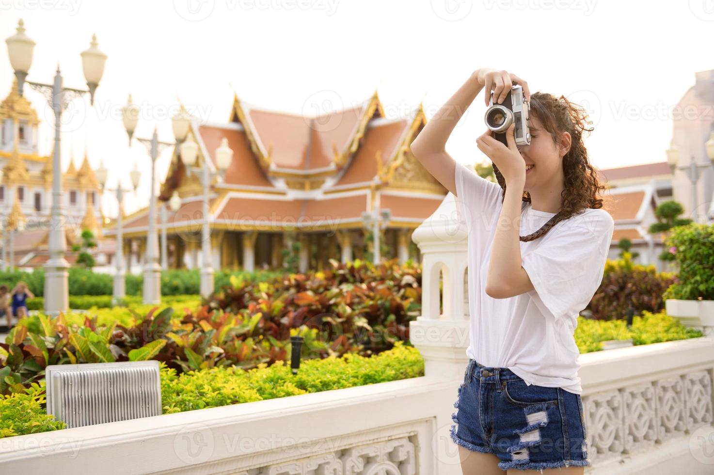 Beautiful young Asian tourist woman on vacation sightseeing and exploring Bangkok city, Thailand, Holidays and traveling concept photo