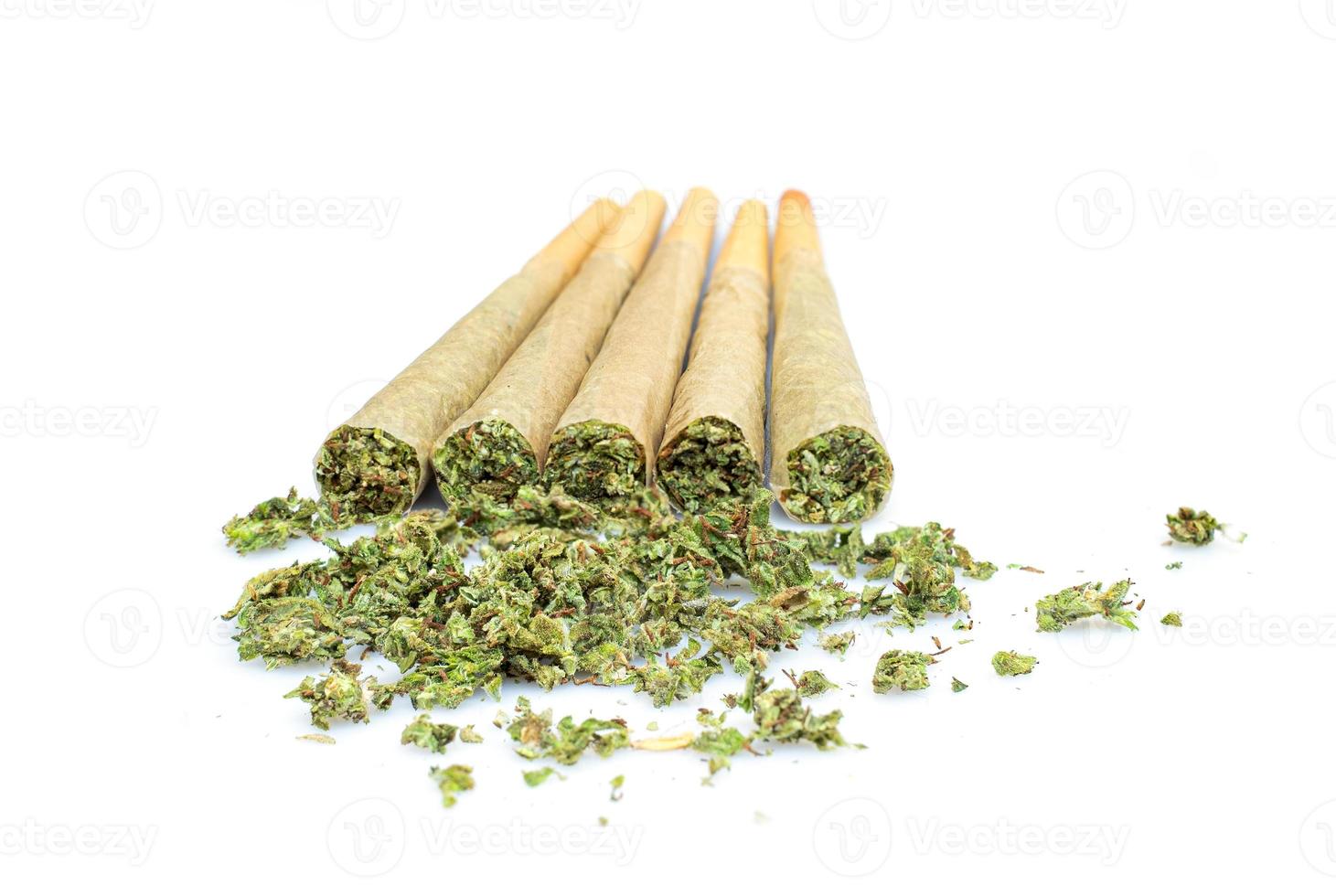 Marijuana joint pre-rolled cone paper on white background,  roll paper cannabis photo