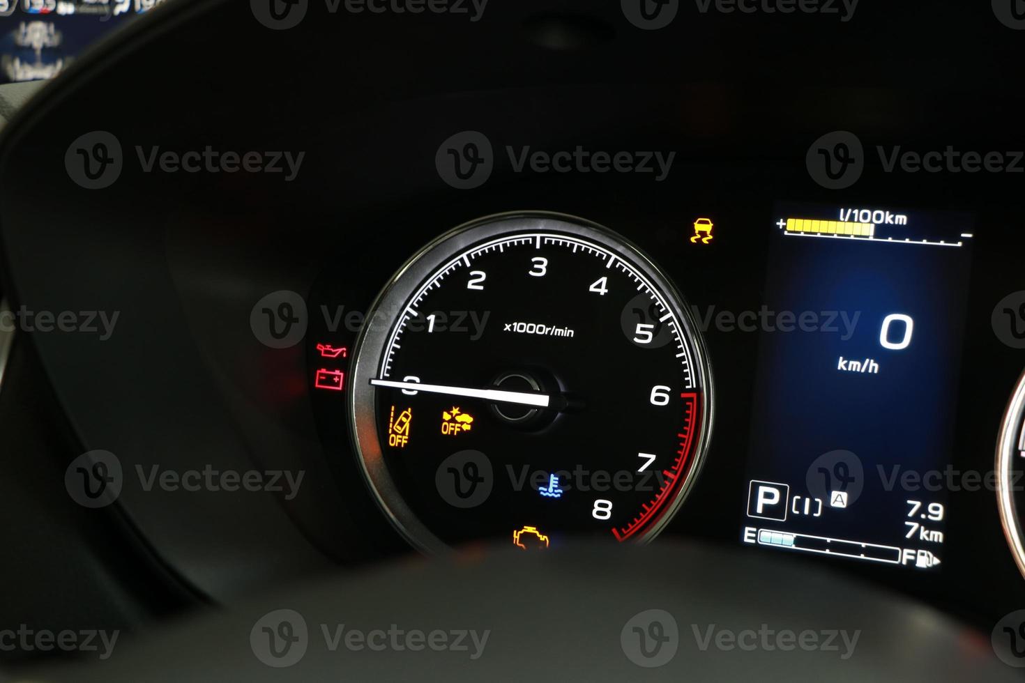 Operation warning lights and tachometer in the dashboard photo