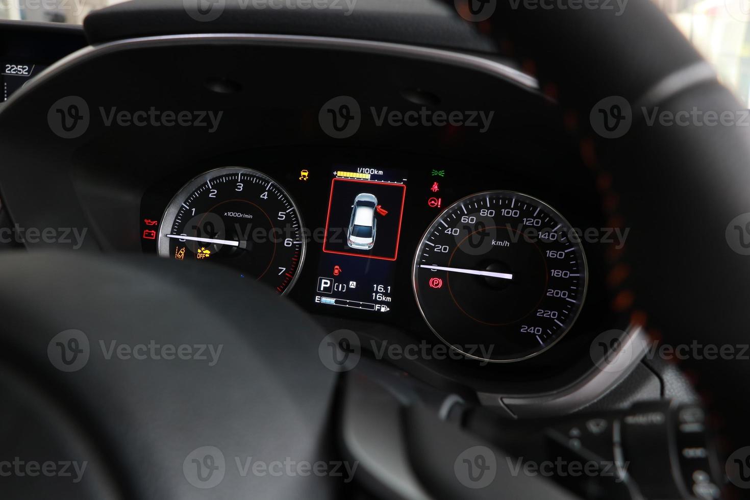 Operation warning lights and speedometer in the dashboard photo