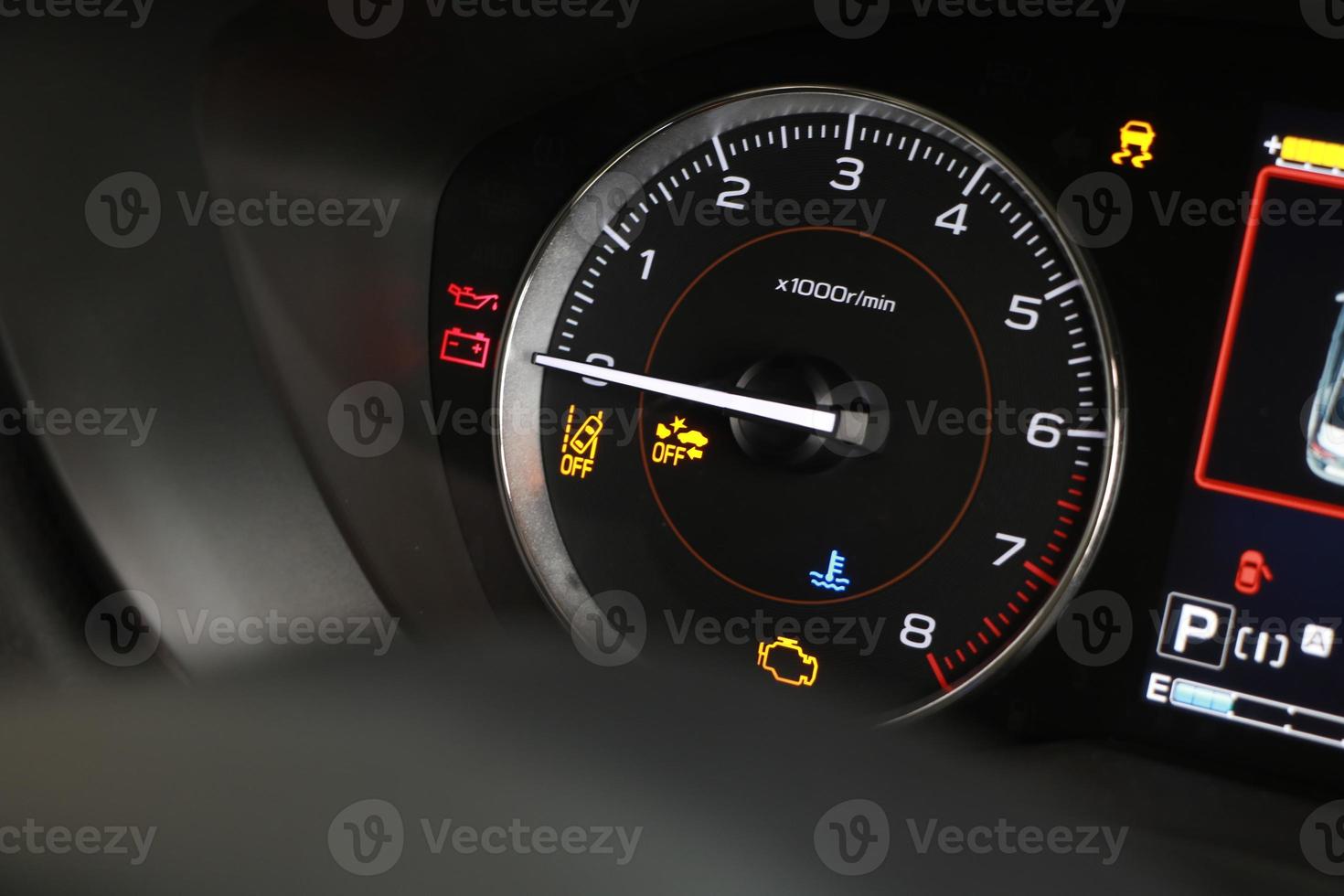 Operation warning lights and tachometer in the dashboard photo