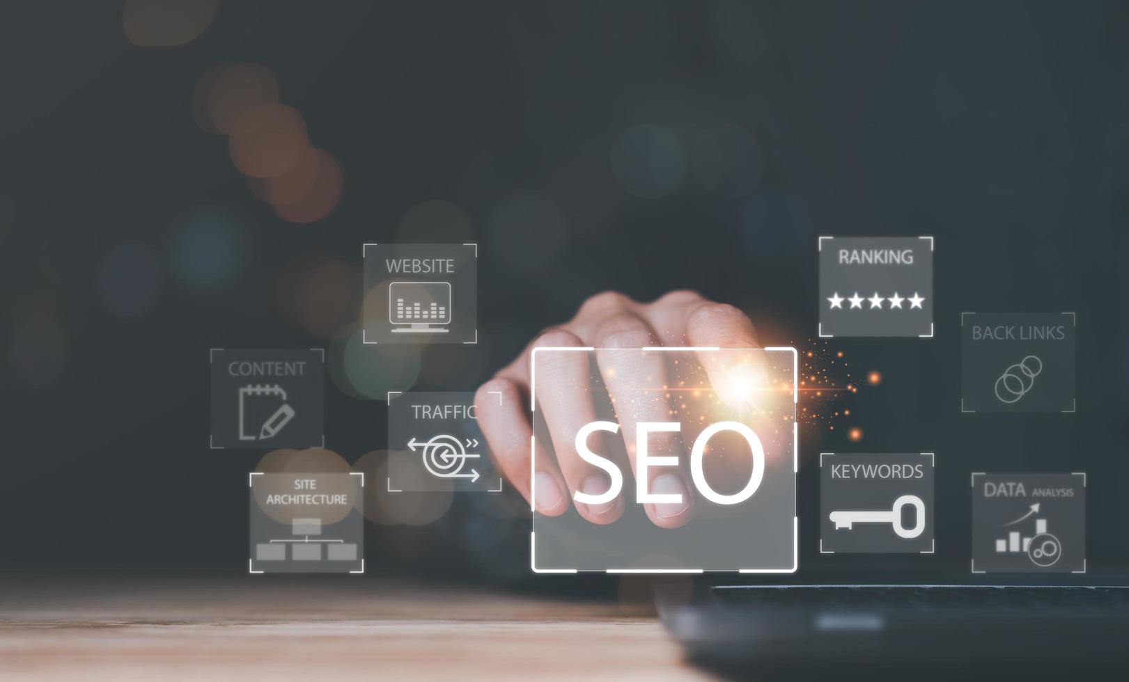 Marketer holding pointing to icon and shows SEO concepts, optimization analysis tools, search engine rankings, social media sites based on results analysis data,Ranking the best sites for search photo