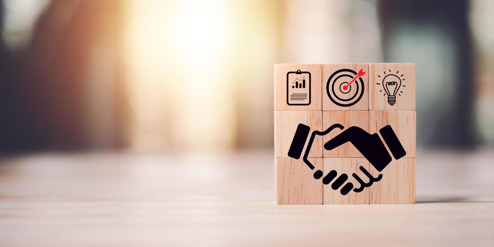 wooden blocks and business icons,business agreement concept,development progress Financial efficiency and investment with business strategies for the future goals and opportunities of the industry. photo