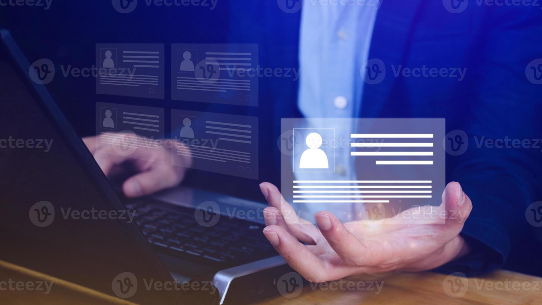 Human resources manager choosing professional profile to hire on virtual screen interface, recruitment concept. Businessman hand pointing icon resource HR management concept photo