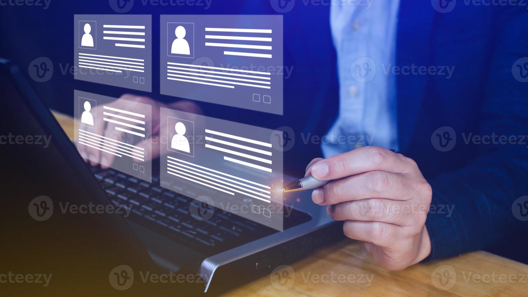 Human resources manager choosing professional profile to hire on virtual screen interface, recruitment concept. Businessman hand pointing icon resource HR management concept photo