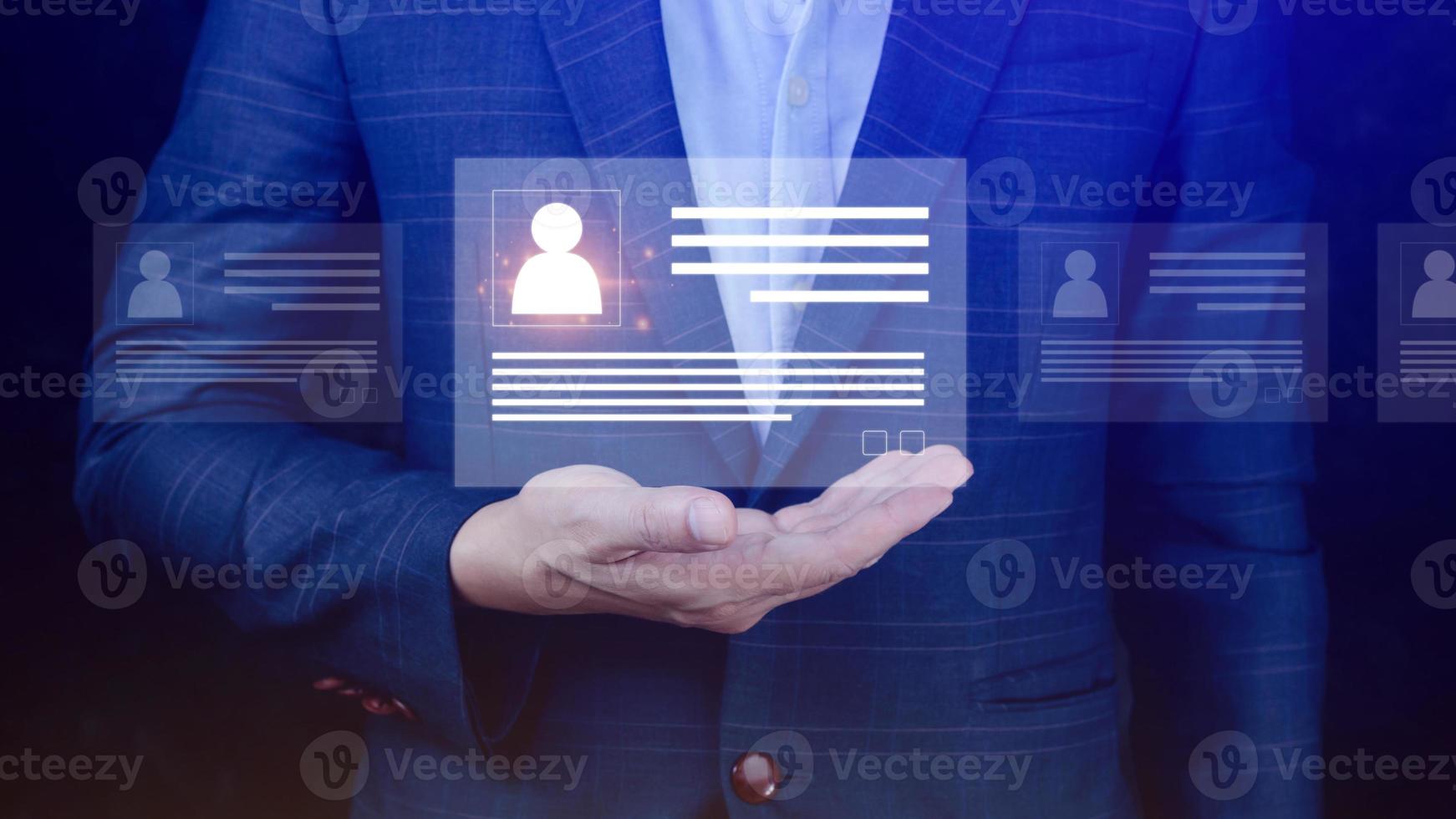 Human resources manager choosing professional profile to hire on virtual screen interface, recruitment concept. Businessman hand pointing icon resource HR management concept photo