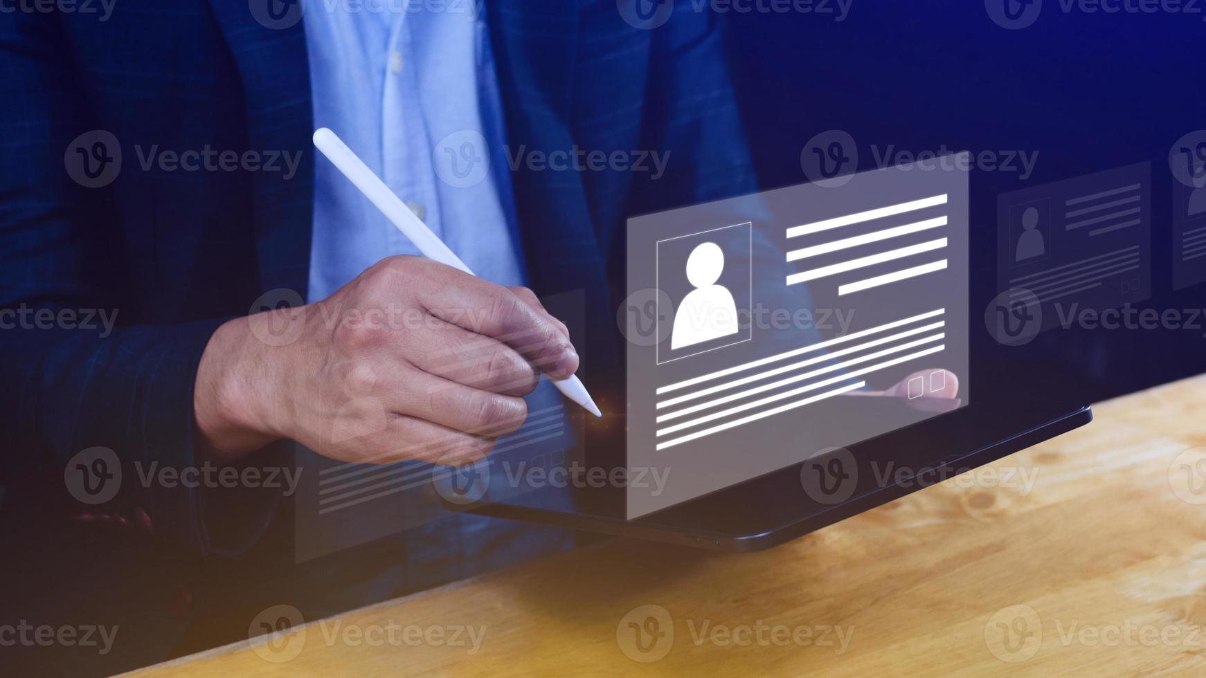 Human resources manager choosing professional profile to hire on virtual screen interface, recruitment concept. Businessman hand pointing icon resource HR management concept photo