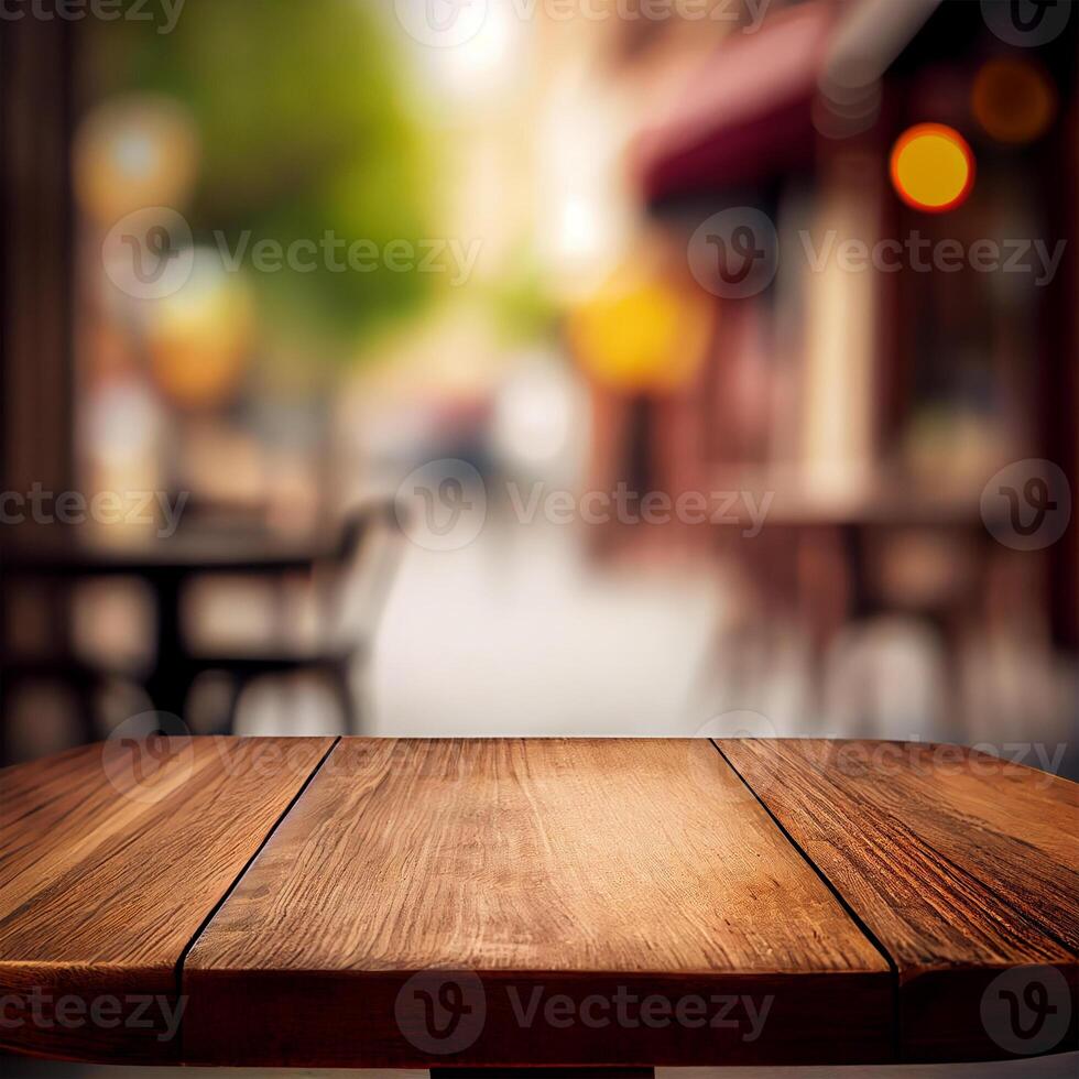 Wooden table top in cafe blurred bokeh background - image photo