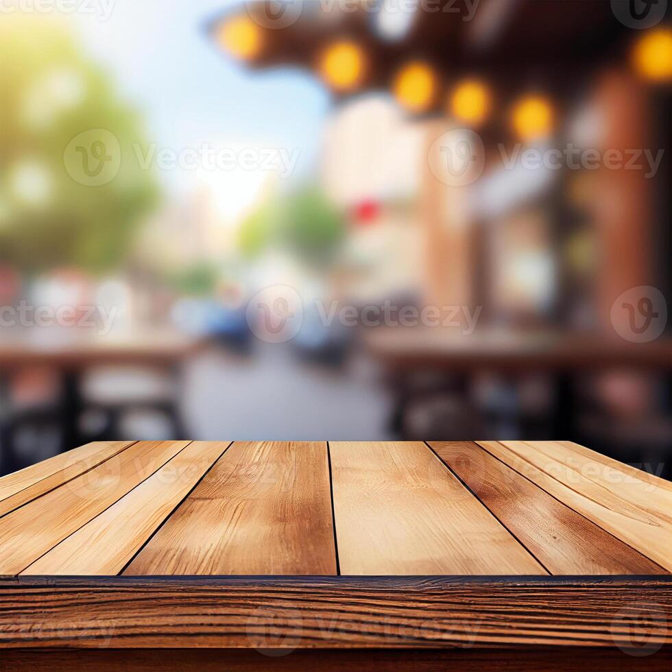 Wooden table top in cafe blurred bokeh background - image photo