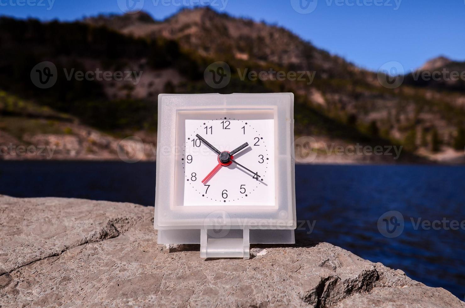 Clock on the rocks photo