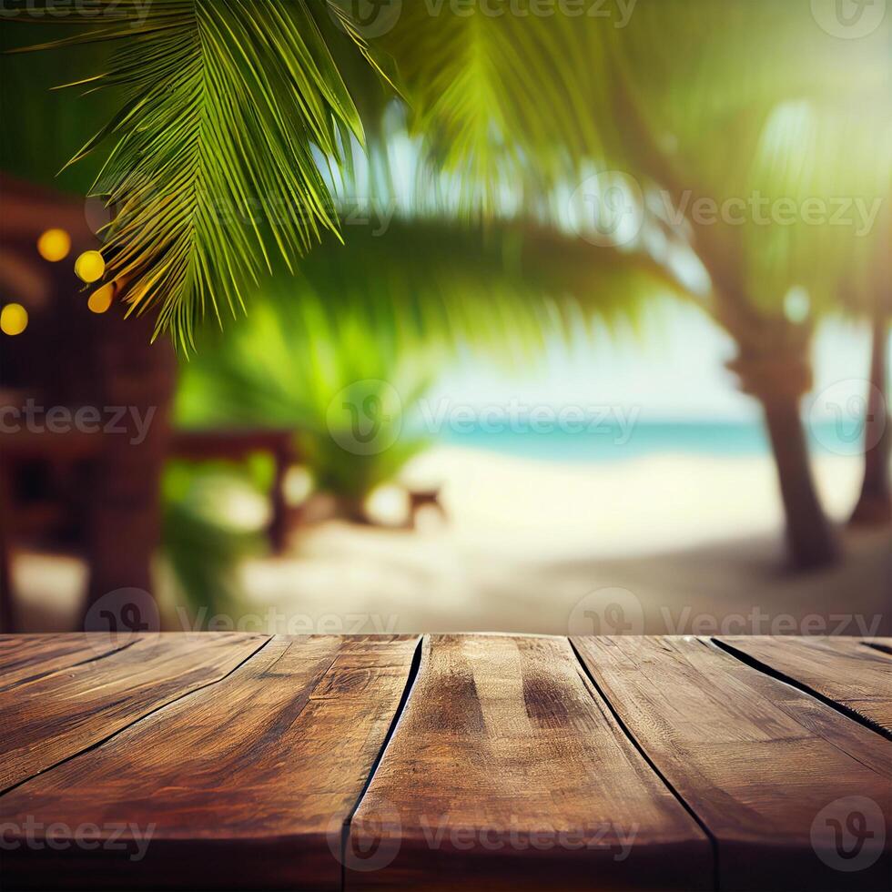 Old wooden table top on blurred beach background with coconut palm