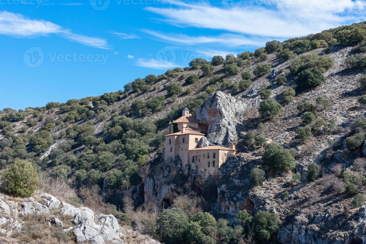 Romanesque stone monastery on the top of the mountain in the city of Soria in Spain. photo