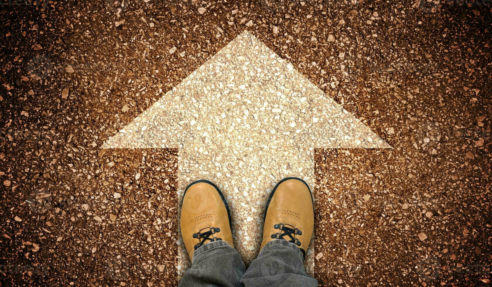 Yellow Leather Shoes and Chalky Arrow on Ground - Forward Concept photo