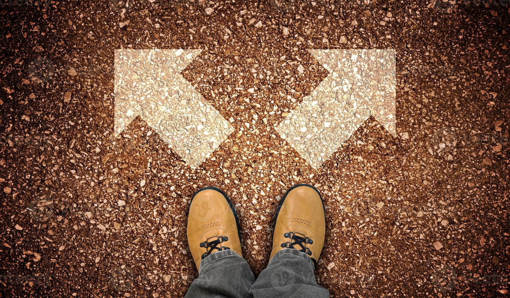 Yellow Leather Shoes and Two Right and Left Chalky Arrows on Ground - Choice Concept photo