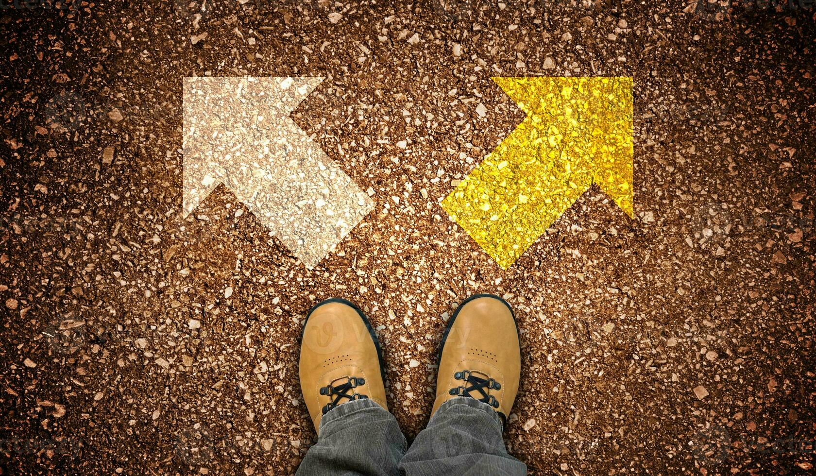 Yellow Leather Shoes and Two Right and Left Chalky Arrows on Ground - Choice Concept photo
