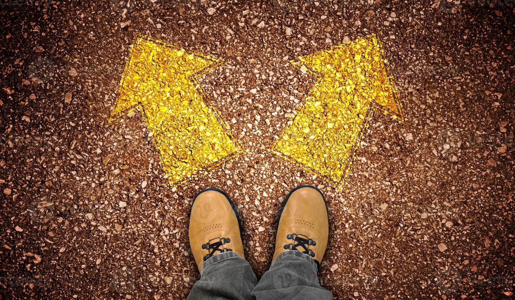Yellow Leather Shoes and Two Right and Left Chalky Arrows on Ground - Choice Concept photo