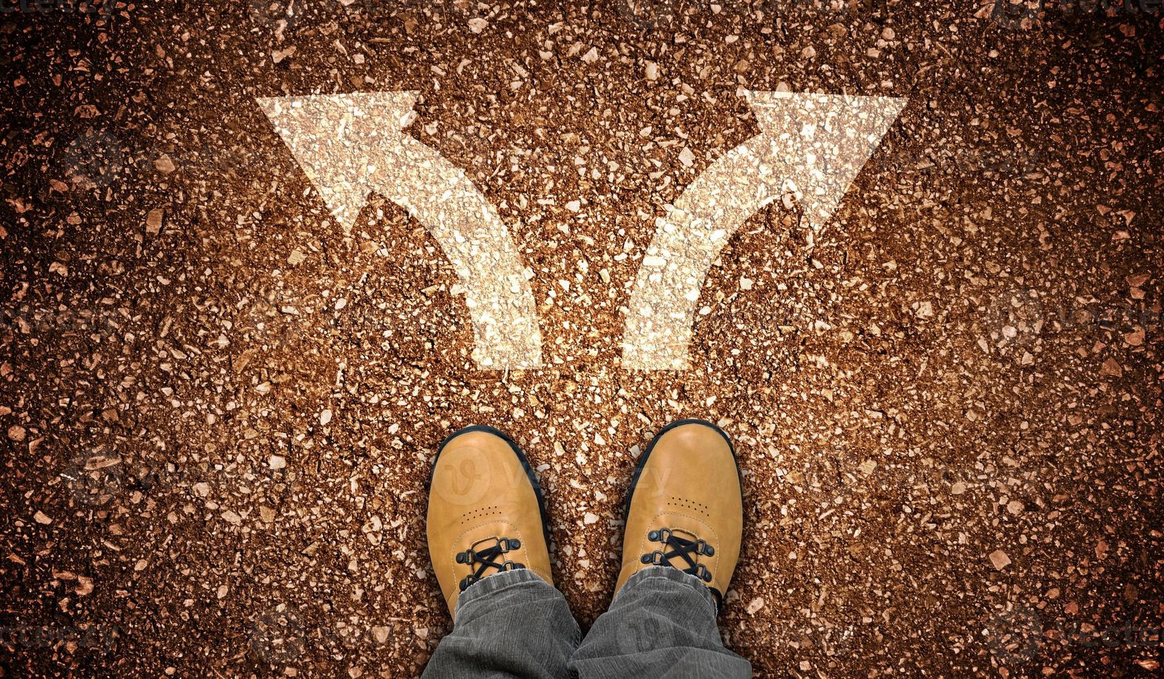 Yellow Leather Shoes and Two Right and Left Chalky Arrows on Ground - Choice Concept photo