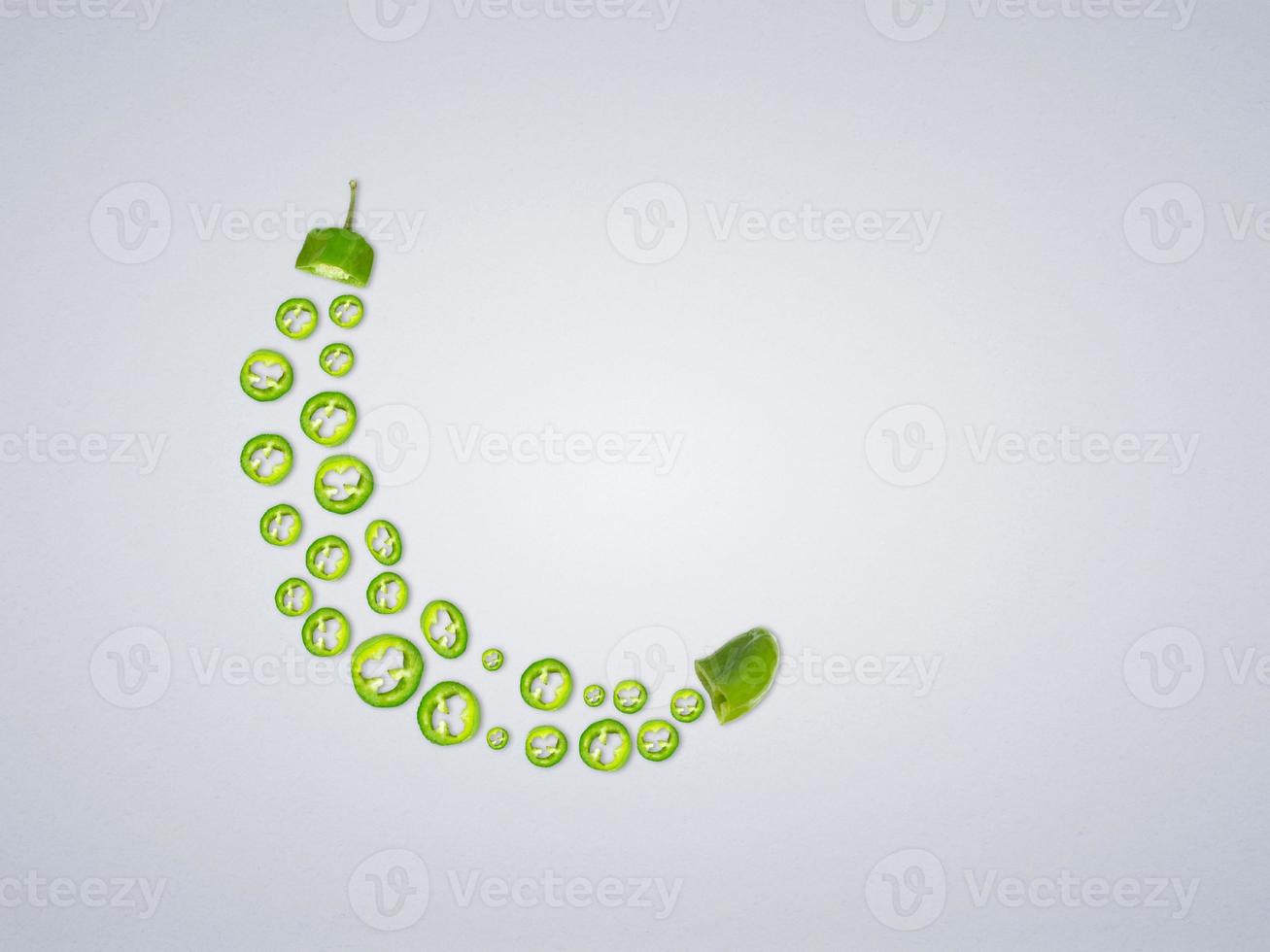 Photo green chilli moon shape happy ramadan happy eid concept. muslim holy month ramadan kareem