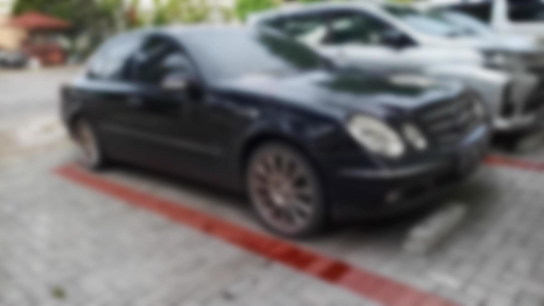 Photo of a car park with a blurred background