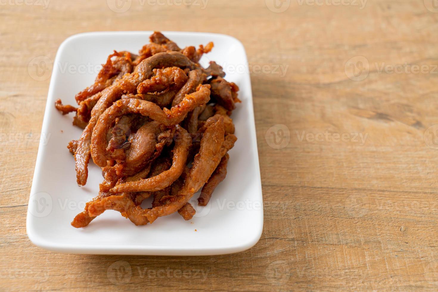 Sun-Dried Pork on white plate photo