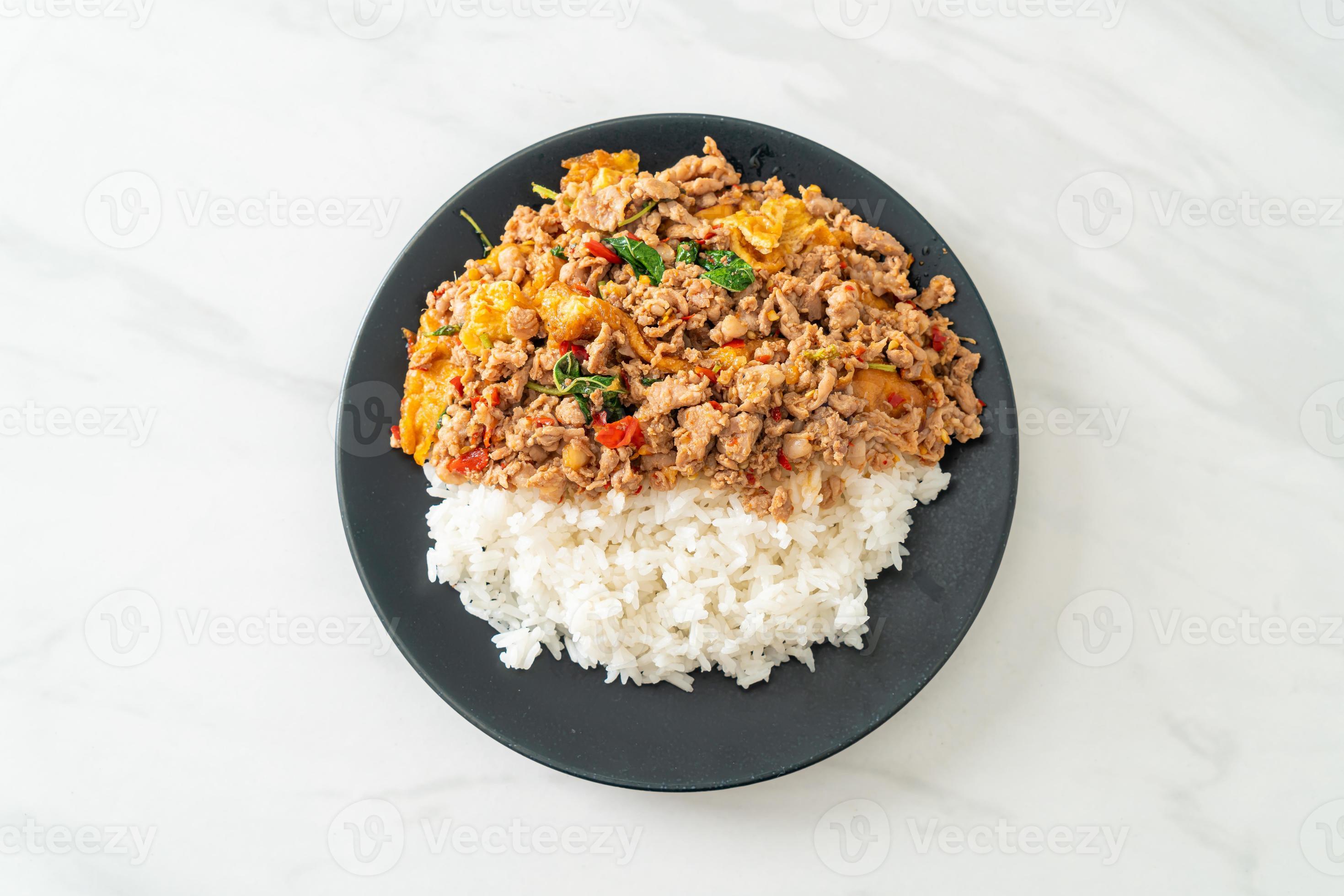 stirfried minced pork with basil and egg topped on rice 21705384 Stock