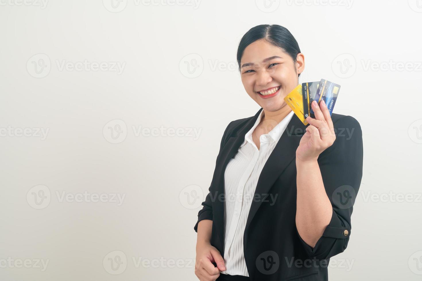 Asian woman holding credit card with white background photo