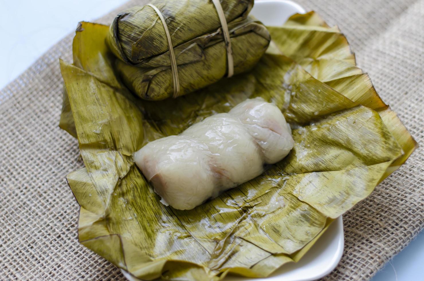 Top view Khao Tom Mad or Dessert sticky rice There is a banana or taro filling inside. Ancient Thai desserts. photo