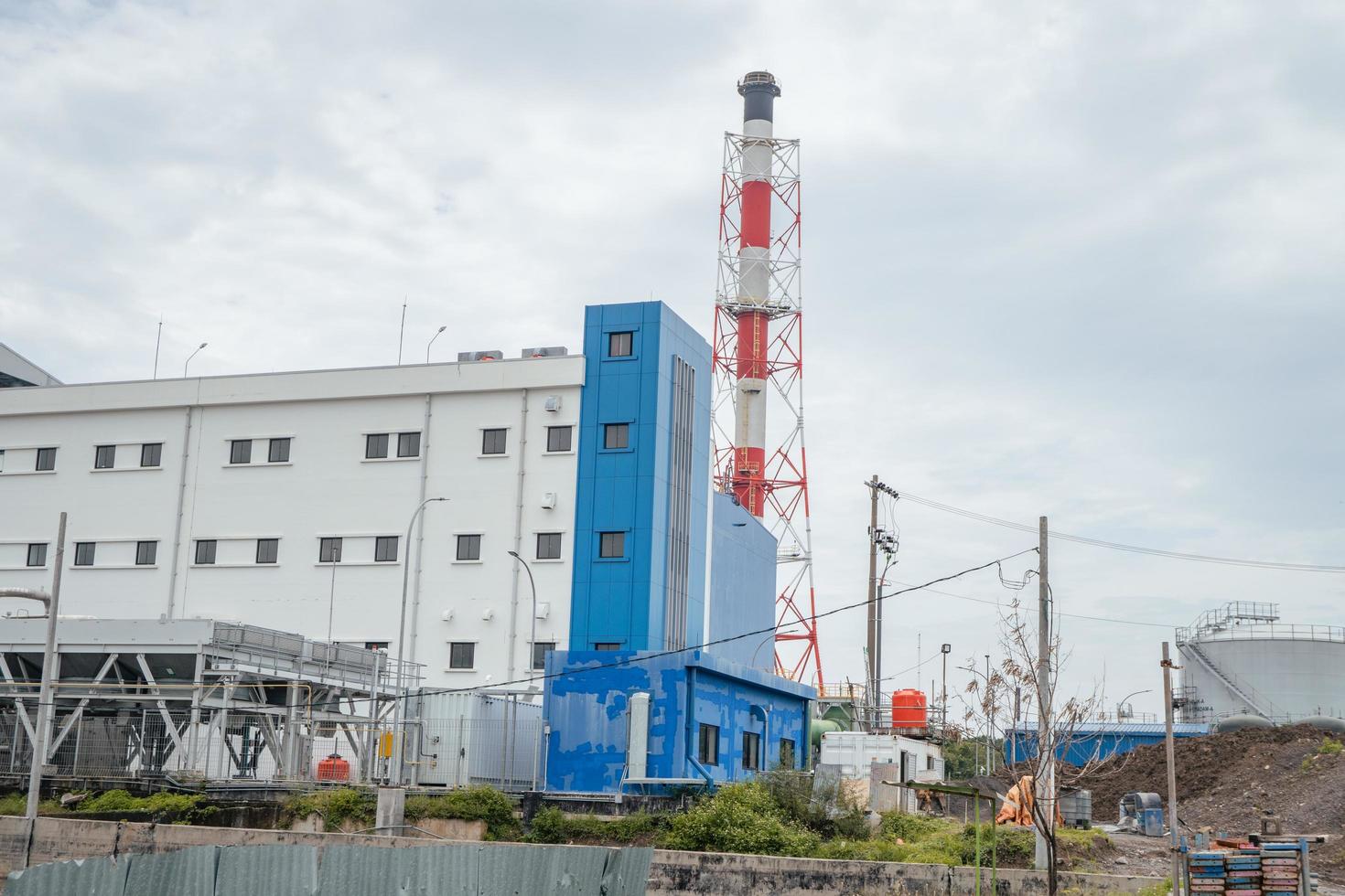 Admin building on the power plant area. The photo is suitable to use for industry background photography, power plant poster and electricity content media.