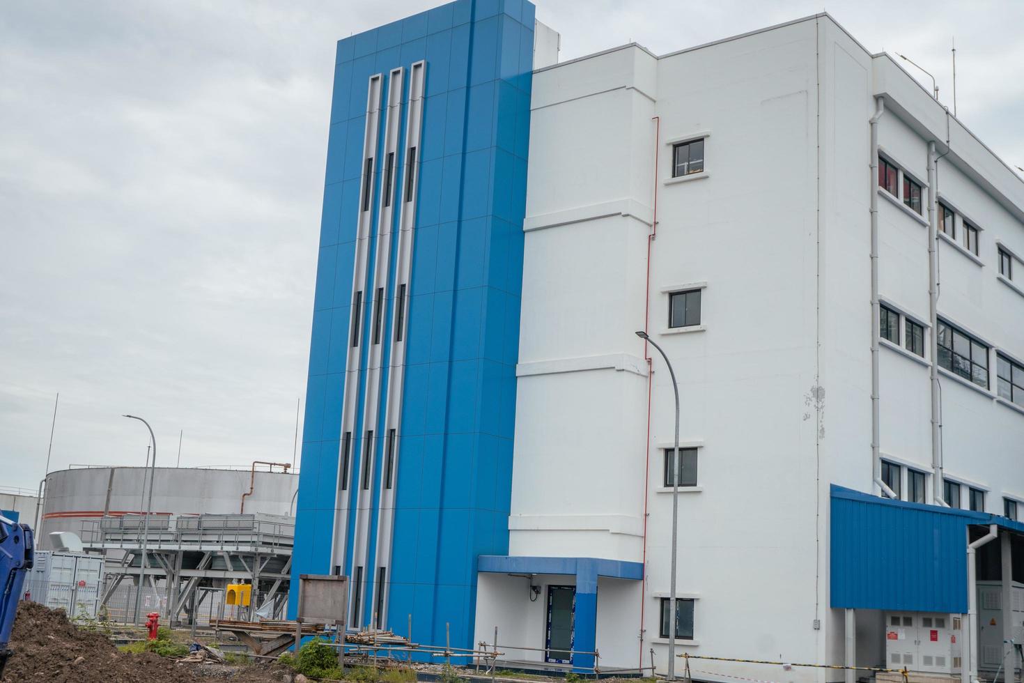 Admin building on the power plant area. The photo is suitable to use for industry background photography, power plant poster and electricity content media.