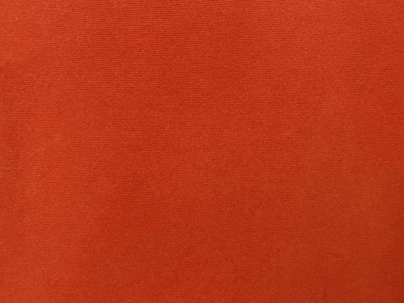 Orange velvet fabric texture used as background. Empty Orange fabric background of soft and smooth textile material. There is space for text. photo