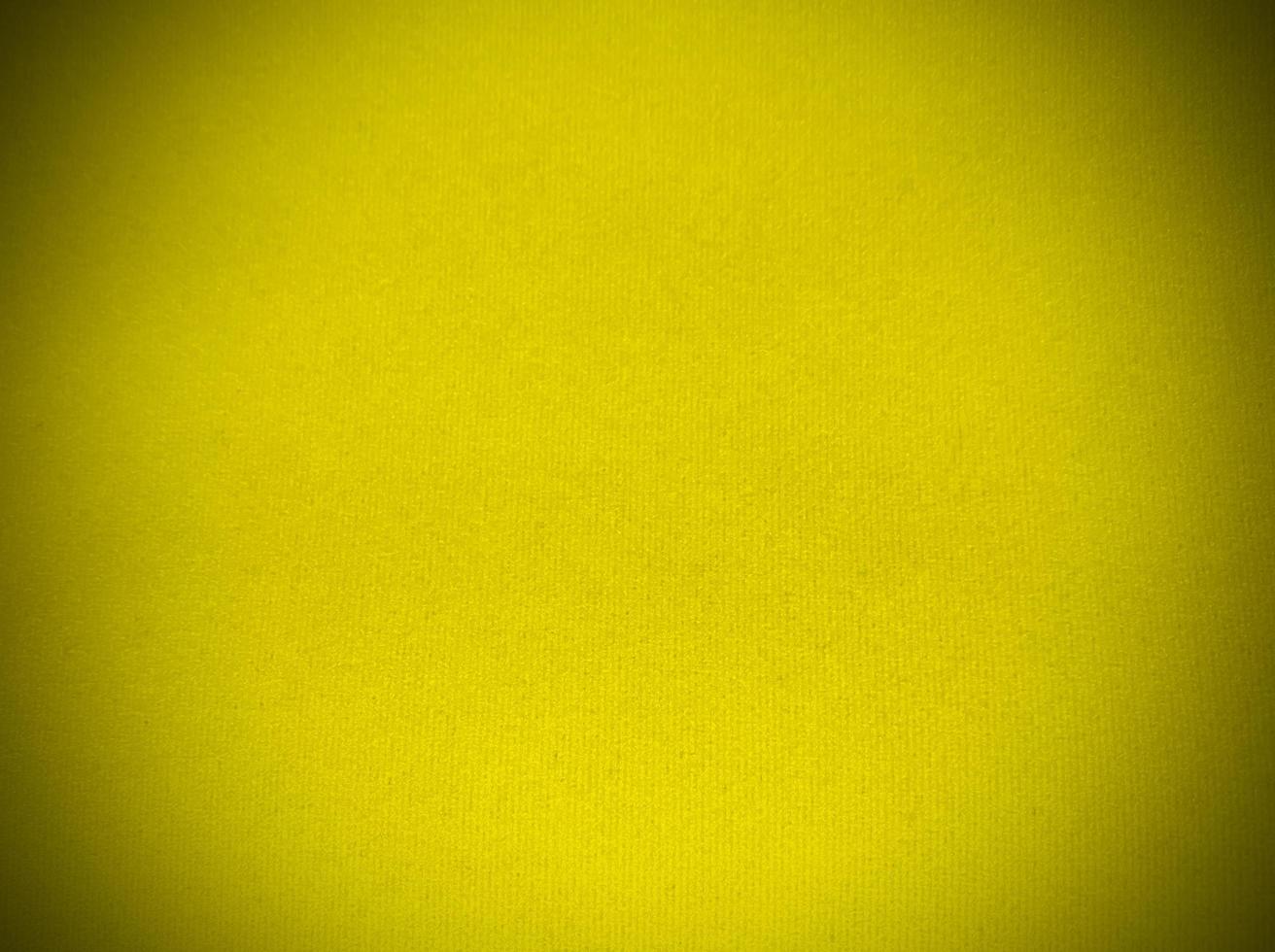 Yellow velvet fabric texture used as background. Empty yellow fabric background of soft and smooth textile material. There is space for text. photo