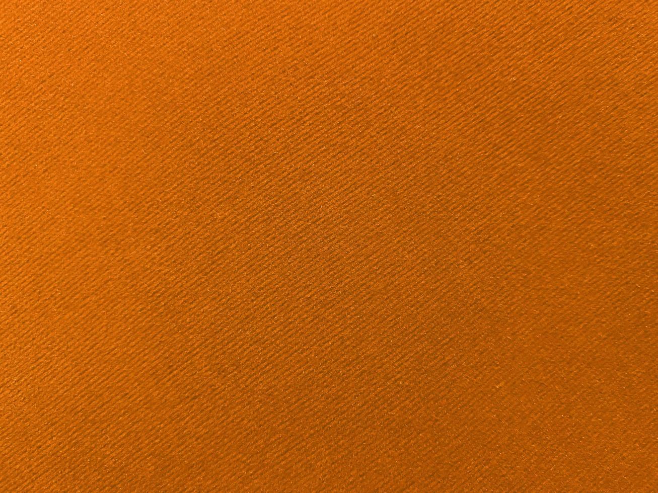 Orange velvet fabric texture used as background. Empty Orange fabric background of soft and smooth textile material. There is space for text. photo