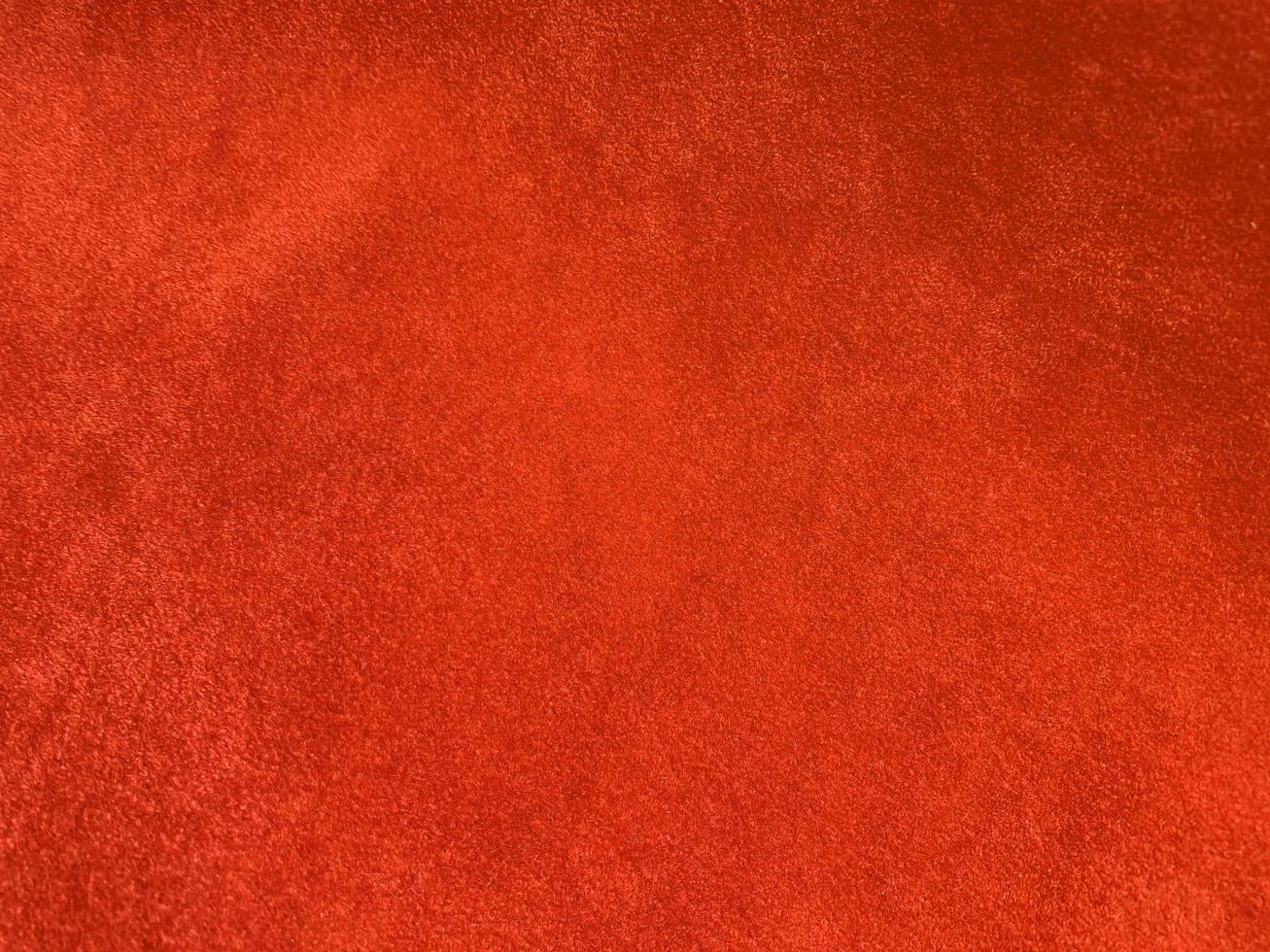 Orange velvet fabric texture used as background. Empty Orange fabric background of soft and smooth textile material. There is space for text. photo